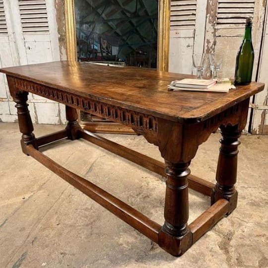 Expert furniture restoration in Adelaide – restored antique wooden table with intricate details.