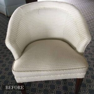 Armchair upholstery repair in Adelaide, featuring frayed fabric edges restored to a professional finish.